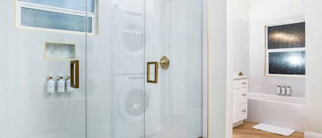 Shower, hair dryer, towels, soap