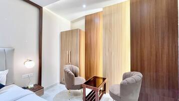 Premium bedding, desk, laptop workspace, soundproofing