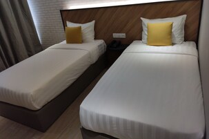 Habitación Deluxe con 2 camas individuales, vistas a la ciudad | Wifi gratis