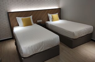 Habitación superior con 2 camas individuales | Wifi gratis