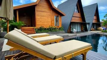 Outdoor pool, pool umbrellas, pool loungers