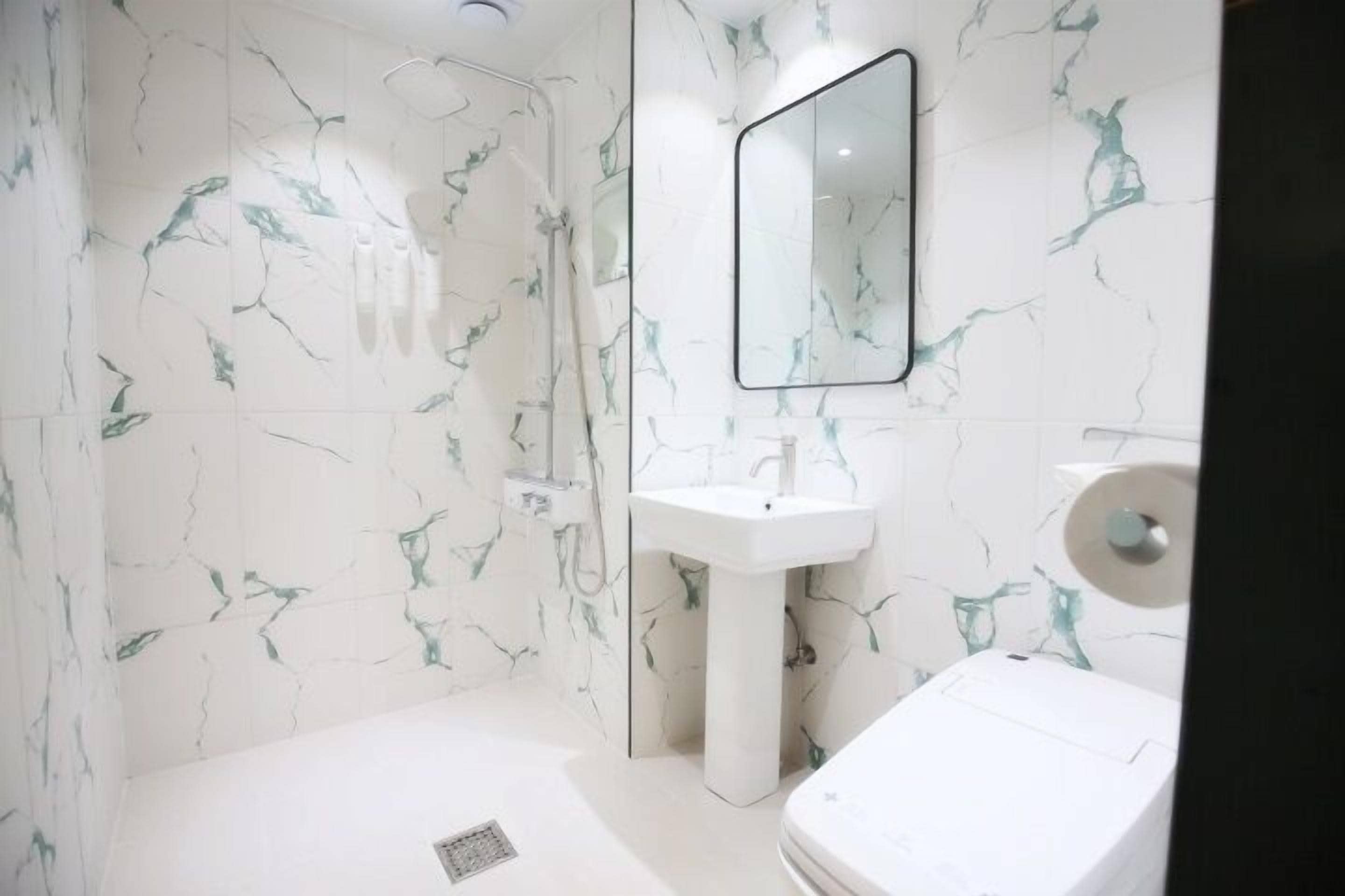 Standard Double Room, City View | Bathroom | Hair dryer, slippers, towels, soap