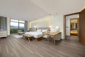 Superior Suite, 1 King Bed, Balcony, Partial Lake View | Living area