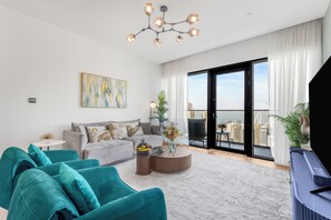 Luxury Apartment, 3 Bedrooms, Non Smoking, Marina View | Living area | 55-inch Smart TV with cable channels, Netflix, streaming services - EDEN’S Homes & Villas - VIDA Dubai Marina Residences (Dubai)