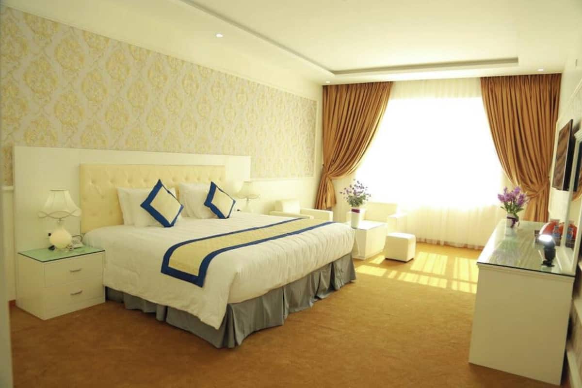 Chambre double | Minibar, bureau, accĂšs au Wi-Fi (inclus), literie fournie