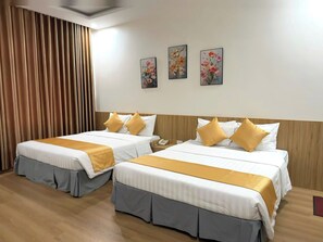 Quadruple Room | Minibar, desk, free WiFi, bed sheets - White Hotel (Vinh)