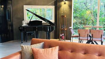 Luxury Villa | Living area | 32-inch flat-screen TV with digital channels, first-run movies