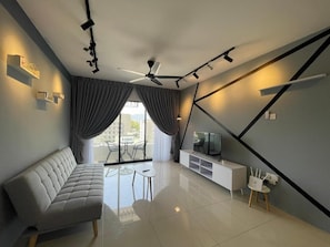 Premier Apartment, 4 Bedrooms | Living area | Flat-screen TV, Netflix, streaming services