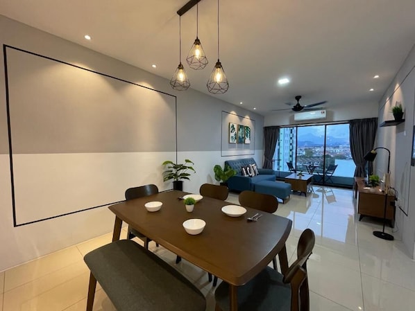 Family Suite, 3 Bedrooms, Pool View | In-room dining