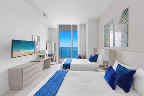 2 bedrooms, desk, iron/ironing board, travel crib