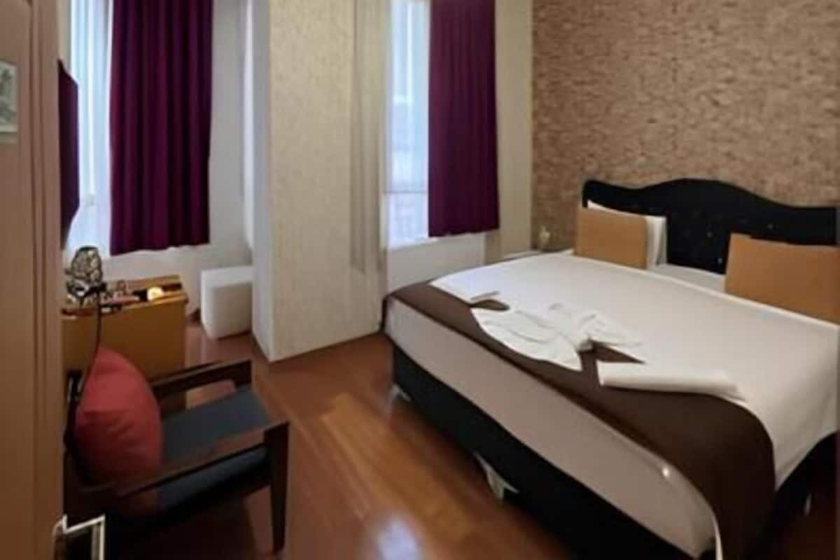 Chambre Premium, plusieurs lits, vue ville | Coffres-forts dans les chambres, chambres insonorisées
