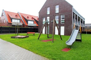 Children’s area - 70sqm apartment for up to 2 people with garden and playground in Norddeich! (Norddeich)