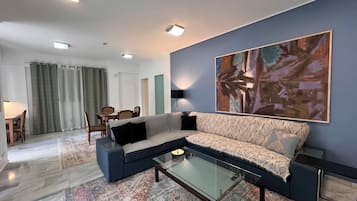 Comfort Apartment, 2 Bedrooms, Executive Level | Living area | Flat-screen TV