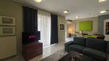 Comfort Apartment, 2 Bedrooms | Living area | Flat-screen TV