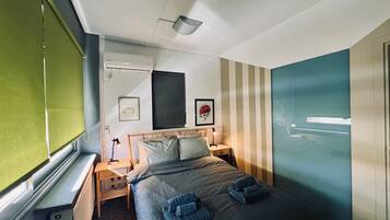 Comfort Apartment, 2 Bedrooms | 1 bedroom, desk, laptop workspace, iron/ironing board