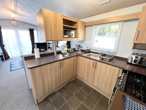 Fridge, microwave, oven, stovetop - 2 Bedroom Caravan NV13, Lower Hyde, Shanklin, Isle of Wight (Shanklin)