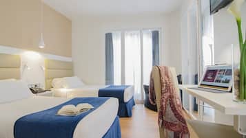 Premium bedding, down comforters, free minibar, in-room safe
