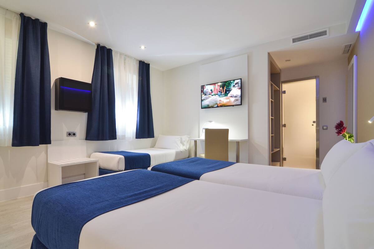 Triple Room | Premium bedding, down comforters, minibar (free items), in-room safe