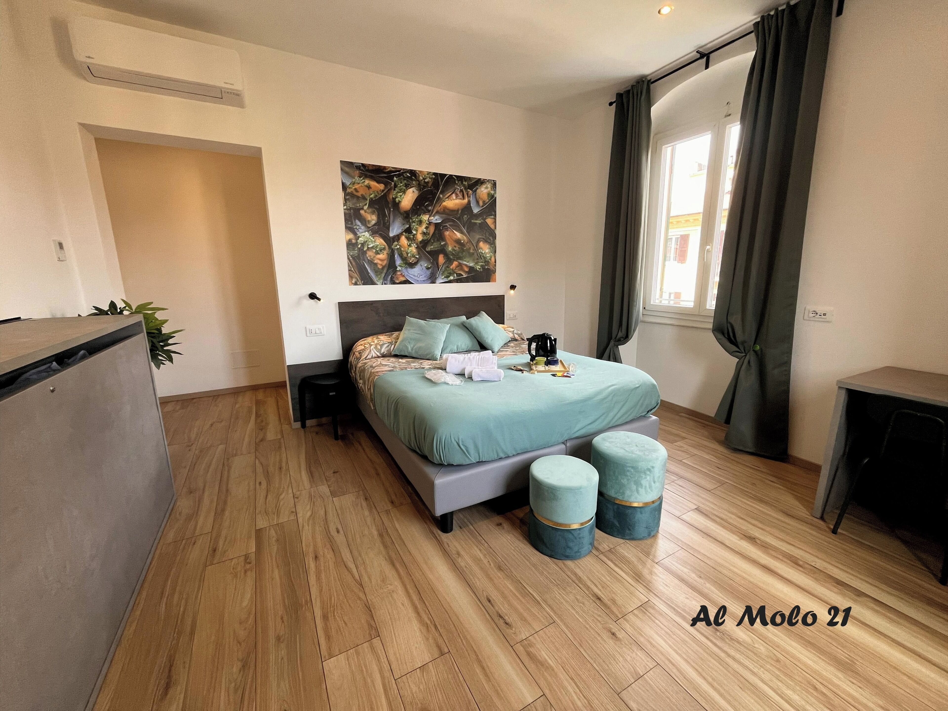 Comfort Triple Room, City View | Down comforters, in-room safe, individually decorated