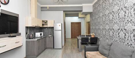 Appartamento Deluxe, vista città | Area soggiorno