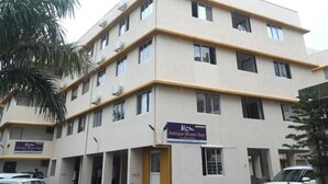 A multi-story building with a sign for 'Antique Home Stay'. - Antique Homestay Daman (Daman)