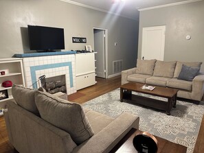 Smart TV, fireplace, books