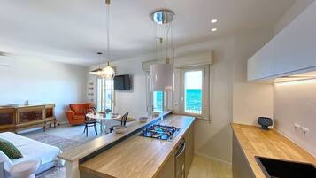 Appartamento, vista mare | Cucina privata | Bollitore elettrico