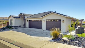 A modern two-story house with a garage, a driveway, and landscaped garden. - 22 Mi to Zion: Mtn-view 'oasis Sanctuary' (Hurricane)
