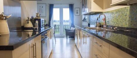 Fridge, dishwasher, cookware/dishes/utensils