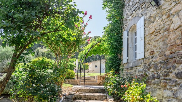 A stone pathway leading to a rustic building with a window and a door. - les Marcellines, character property with heated swimming pool and views (Saint-Restitut)
