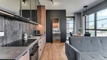 Apartamento Deluxe, vistas a la ciudad | 1 dormitorio, ropa de cama hipoalergénica, decoración individual