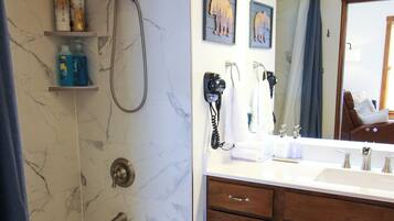 Hair dryer, towels, soap, toilet paper