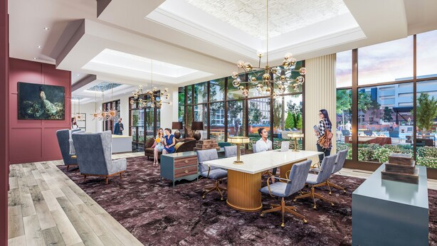 A modern hotel lobby with a large dining area, comfortable seating, and large windows offering views of the outdoors. - Bennet at Bullstreet (Columbia)