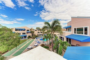 Outdoor dining - Unit #313 Sand Cay Beach Resort Pool and Garden (Longboat Key)