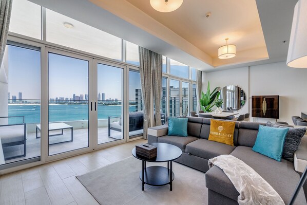 Elite Apartment, 2 Bedrooms, Sea View, Beachfront | Living area | 52-inch flat-screen TV with satellite channels, Netflix, Hulu - Globalstay Luxury Azizi Mina Beachfront  (Dubai)