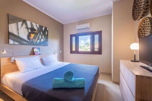 10 habitaciones, tabla de planchar con plancha, wifi y ropa de cama 