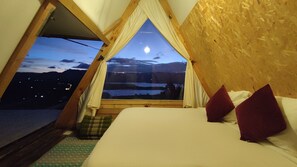 Premium bedding, down comforters, memory foam beds, free minibar