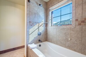 Shower, hair dryer, towels