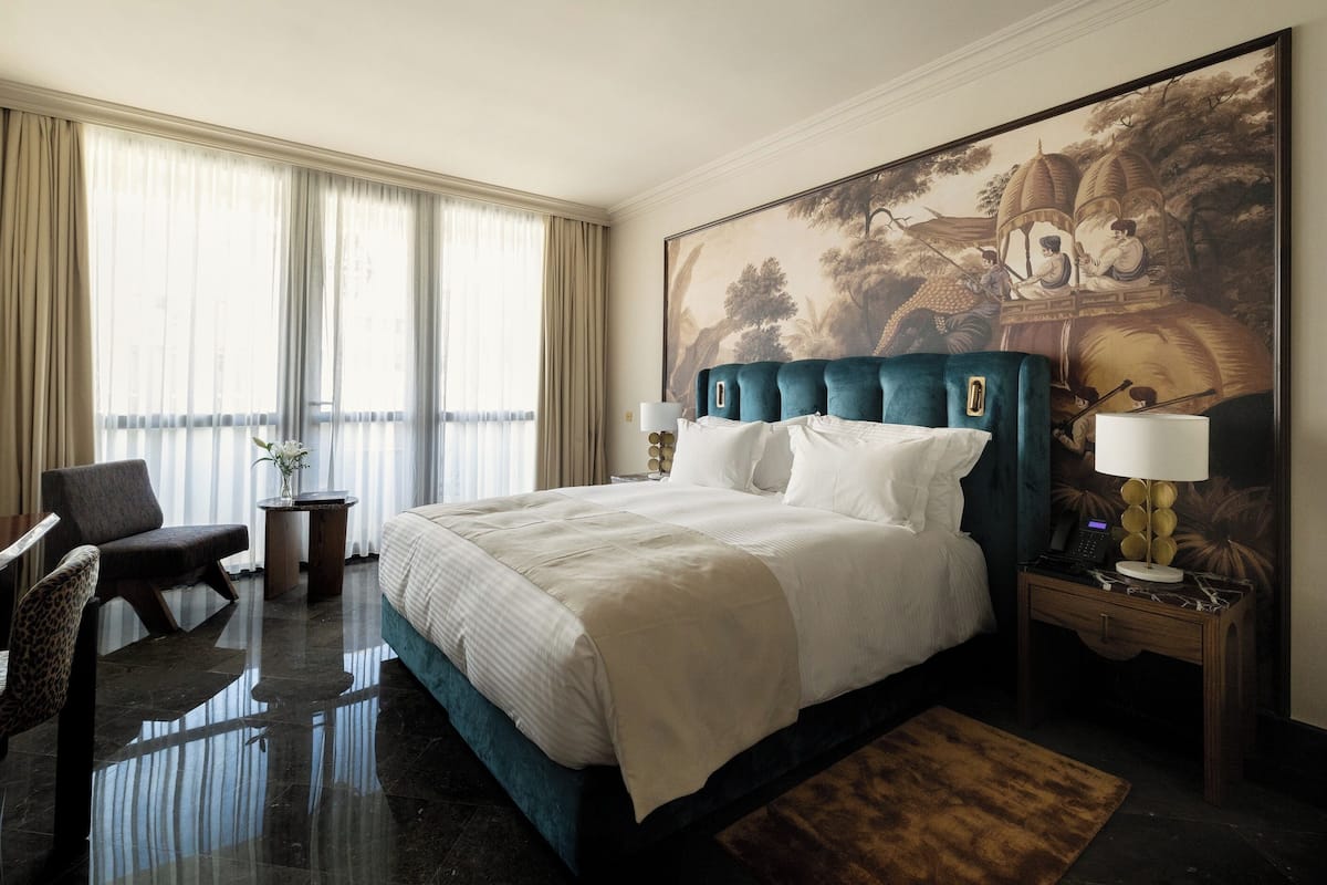 Deluxe Room, Balcony | Frette Italian sheets, premium bedding, in-room safe, desk
