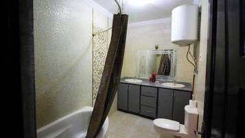 Hair dryer, towels, soap, shampoo