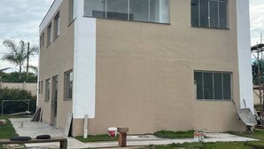 A modern two-story building with large windows and a flat roof. - 1 Near Confins Airport, Cid Galo, 15 min BH, Cid Adm.  (Centro Vespasiano)