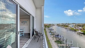 A balcony with a view of a marina and a river. - NEW! Waterfront Luxury in Sarasota – Near Downtown & Beaches! (Sarasota)