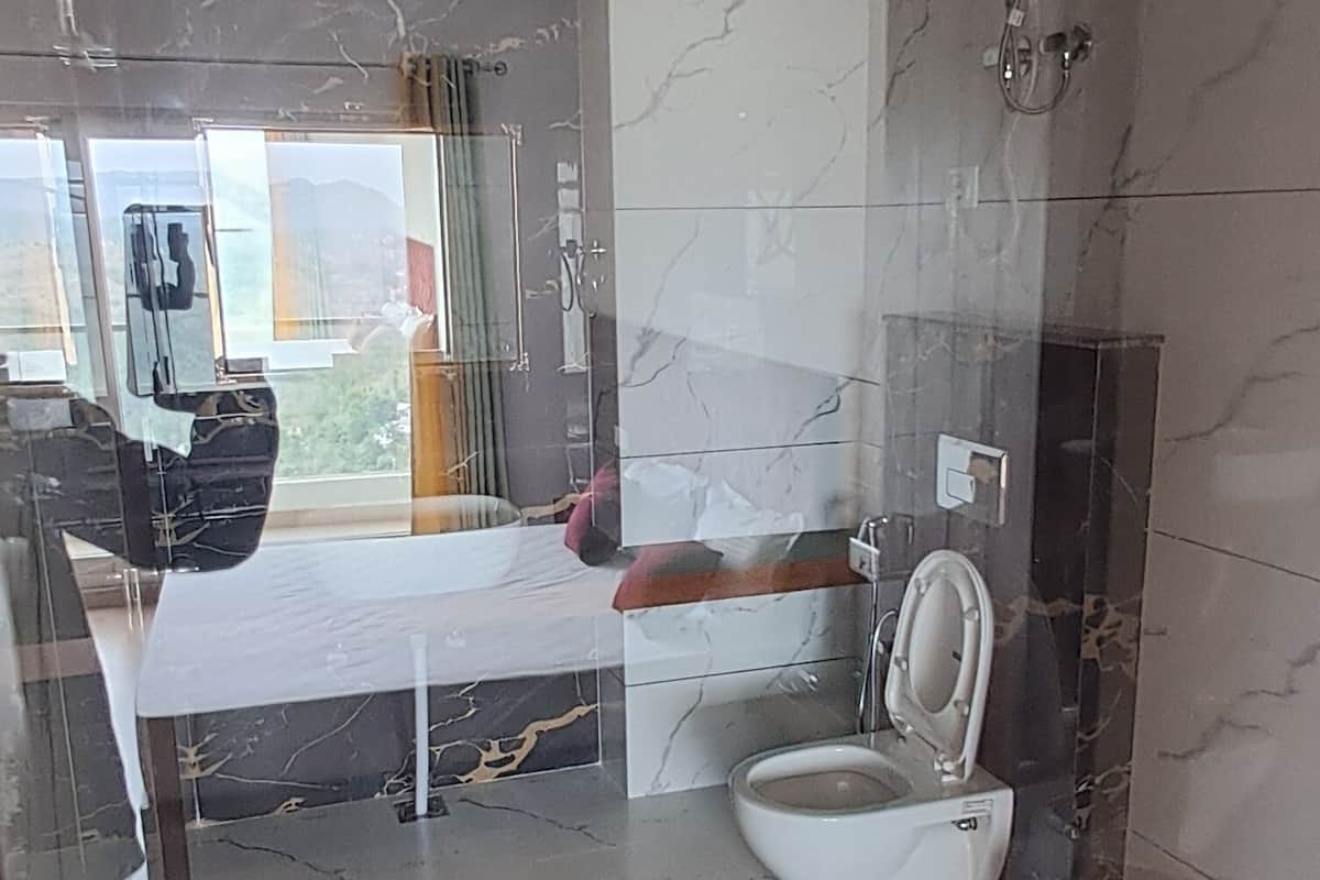 Shower, slippers, towels, soap