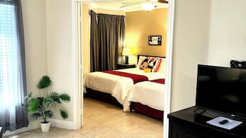 1 habitación, tabla de planchar con plancha, cuna de viaje y wifi