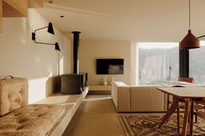Villa Laranjal | Living area | 45-inch Smart TV with cable channels, DVD player, first-run films