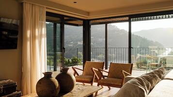 Villa Escola | Living area | 45-inch Smart TV with cable channels, DVD player, first-run films