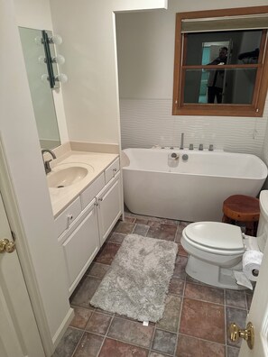 Shower, jetted tub, hair dryer, towels