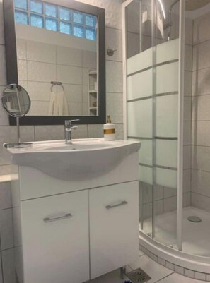 Hair dryer, towels, soap, toilet paper