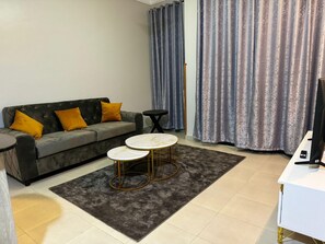 Apartment | Living area - 1 Bed-uganda-2people-wifi-closetocity-parking (Kampala)