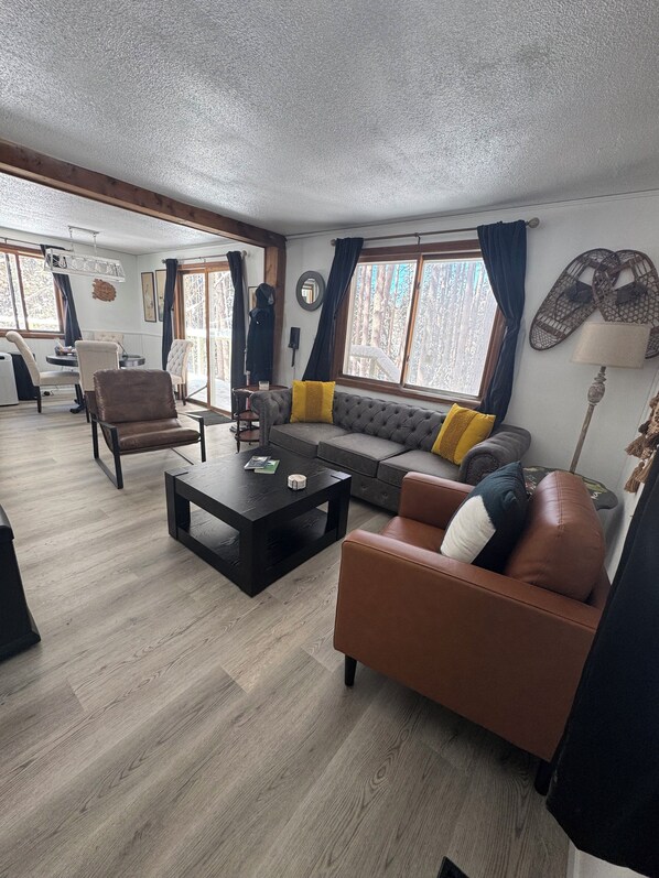 Living area - Your Enchanting Escape to the UP - Central wooded retreat, waterfalls (L'Anse)